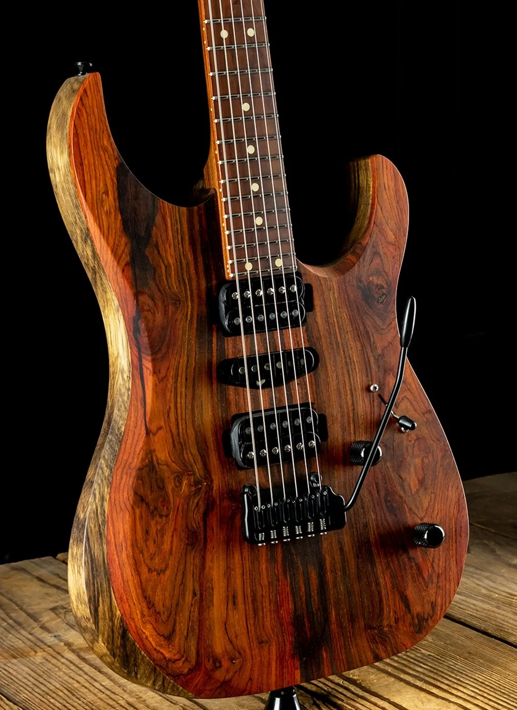 LSL Instruments XT models are modern super s style guitars with 22 or 24 frets and loads of exotic upgrade options. Cocobolo and black Limba, mahogany, quilted maple and custom finishes are common. Ebony or pale moon ebony  or macassar ebony availabl