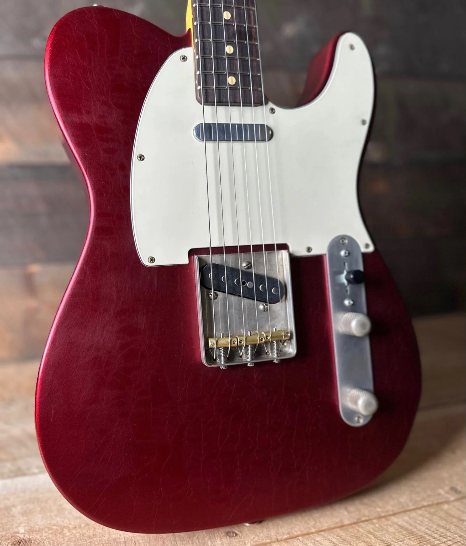 Chris Fleming Series by LSL Instruments. T bone Candy Apple Red with rosewood  board. Sold By Premier Dealer Quimper Sound