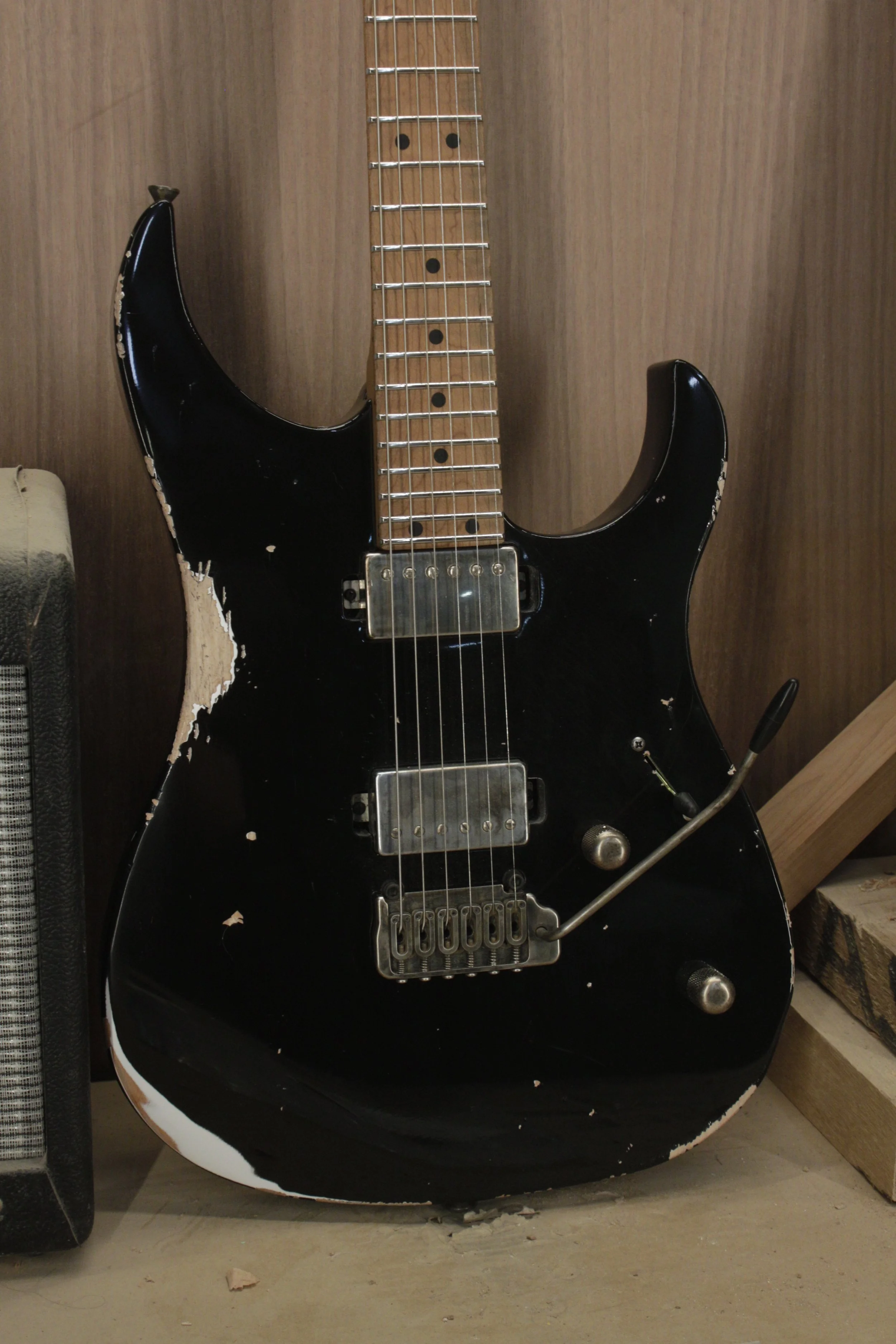 LSL instruments xt2 in black with heavy aging and roasted maple neck and hipshot trem