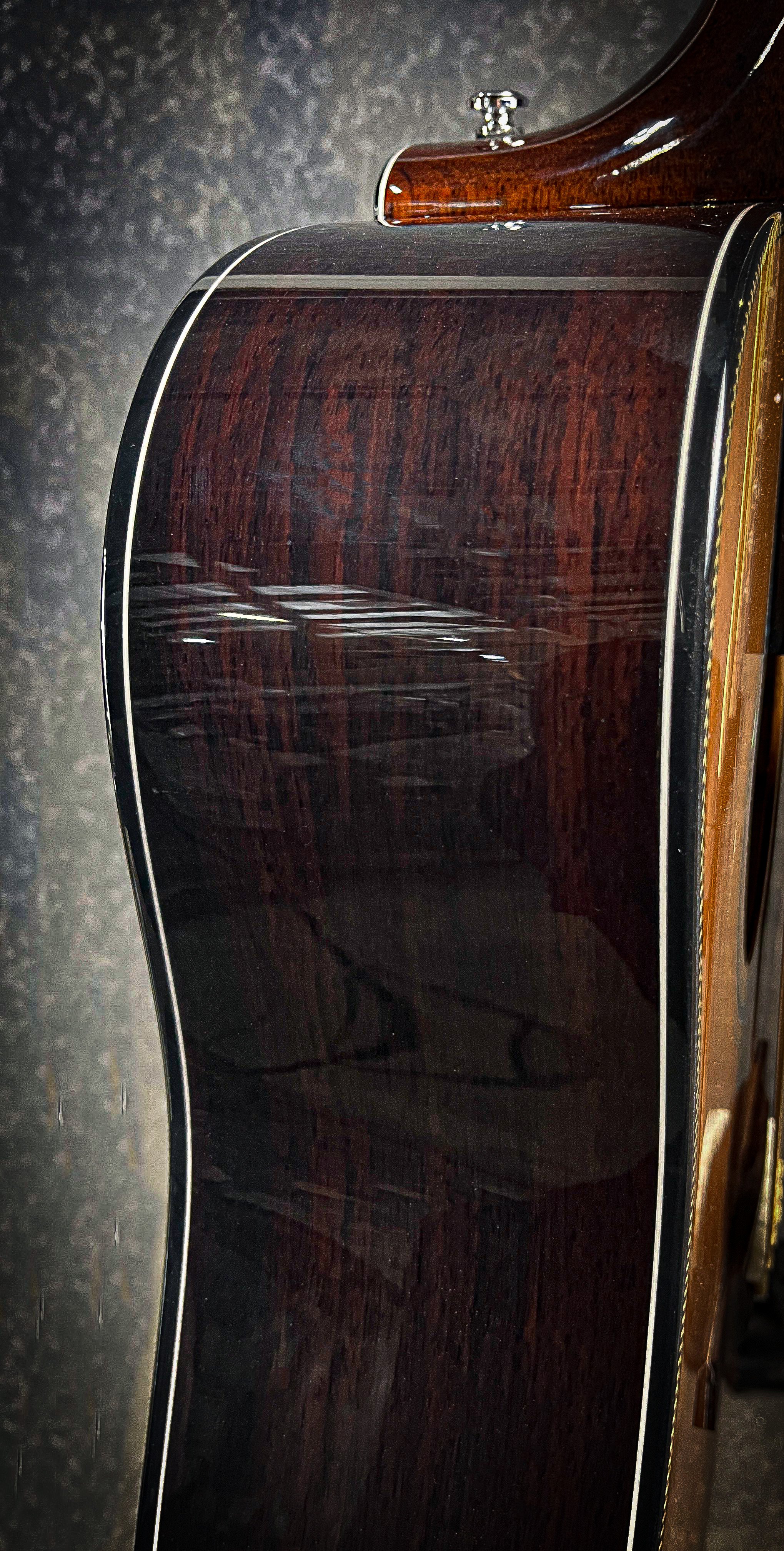 LSL Instruments Santa Clarita Dreadnought Cutaway Acoustic. Solid Rosewood back and sides, solid cedar top, herringbone binding, fishman electronics, Graphtech hardware. High quality import collaboration acoustic models.