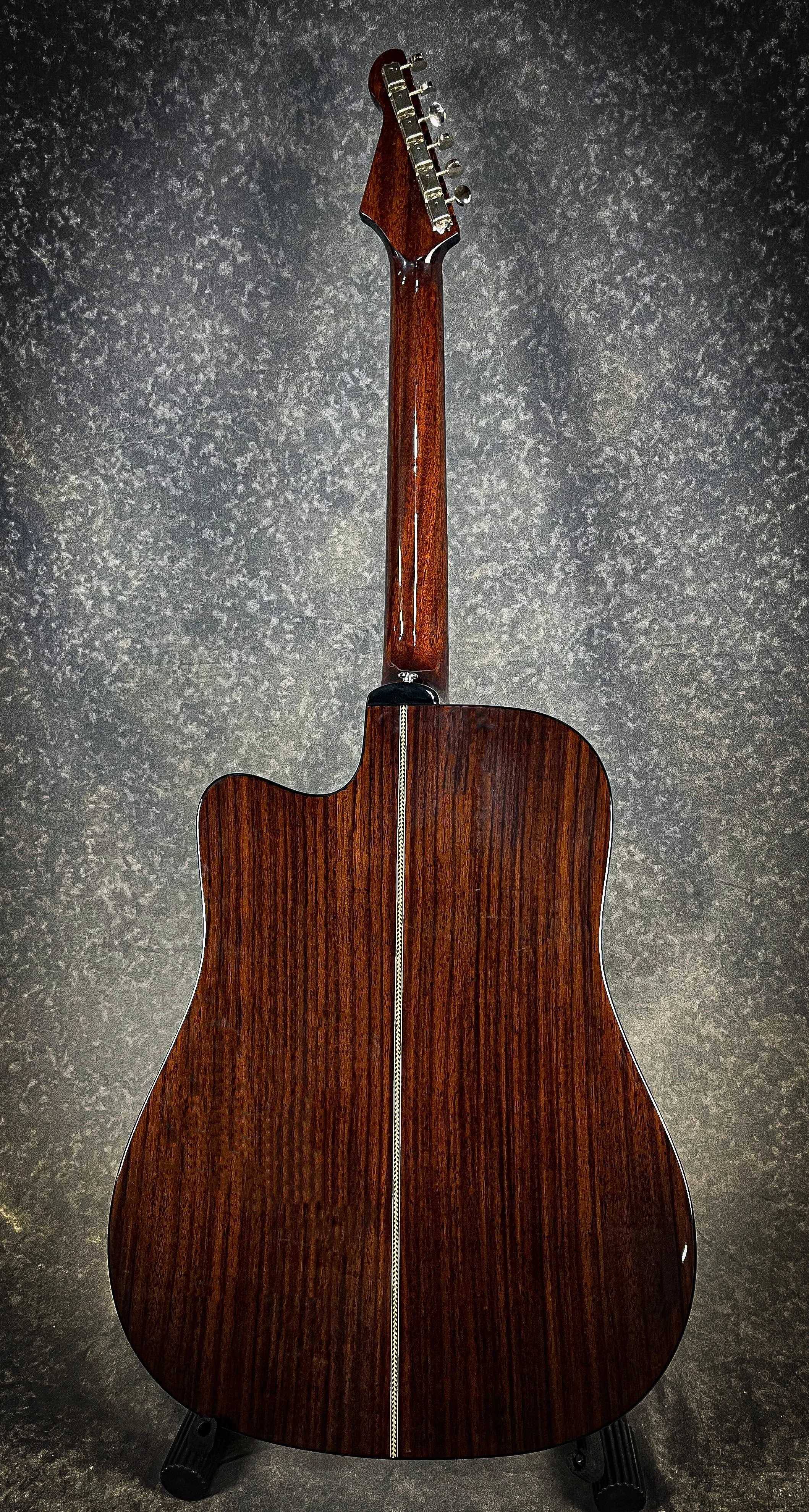 LSL Instruments Santa Clarita Dreadnought Cutaway Acoustic. Solid Rosewood back and sides, solid cedar top, herringbone binding, fishman electronics, Graphtech hardware. High quality import collaboration acoustic models.