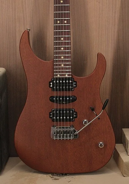 LSL instruments xt4 with okoume body in trans brown finish with roasted maple neck