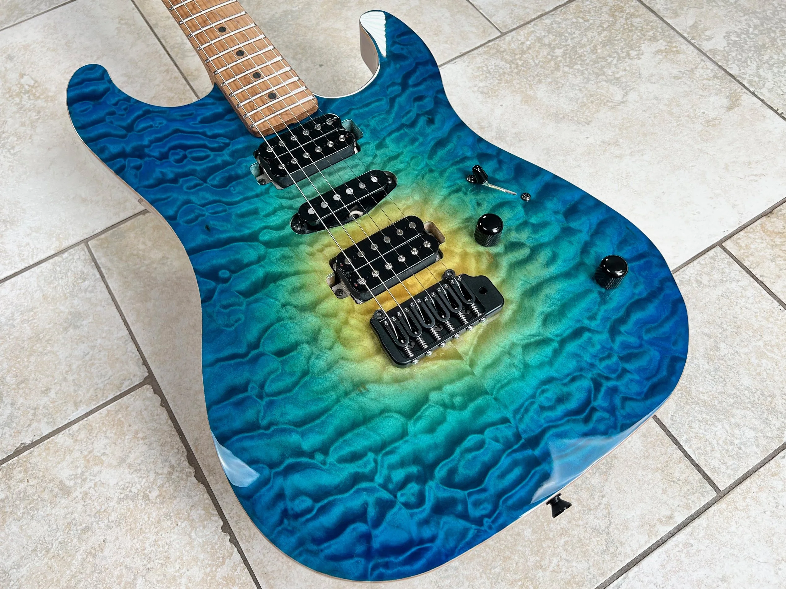 Super exotic island burst xt3dx with museum grade quilted maple