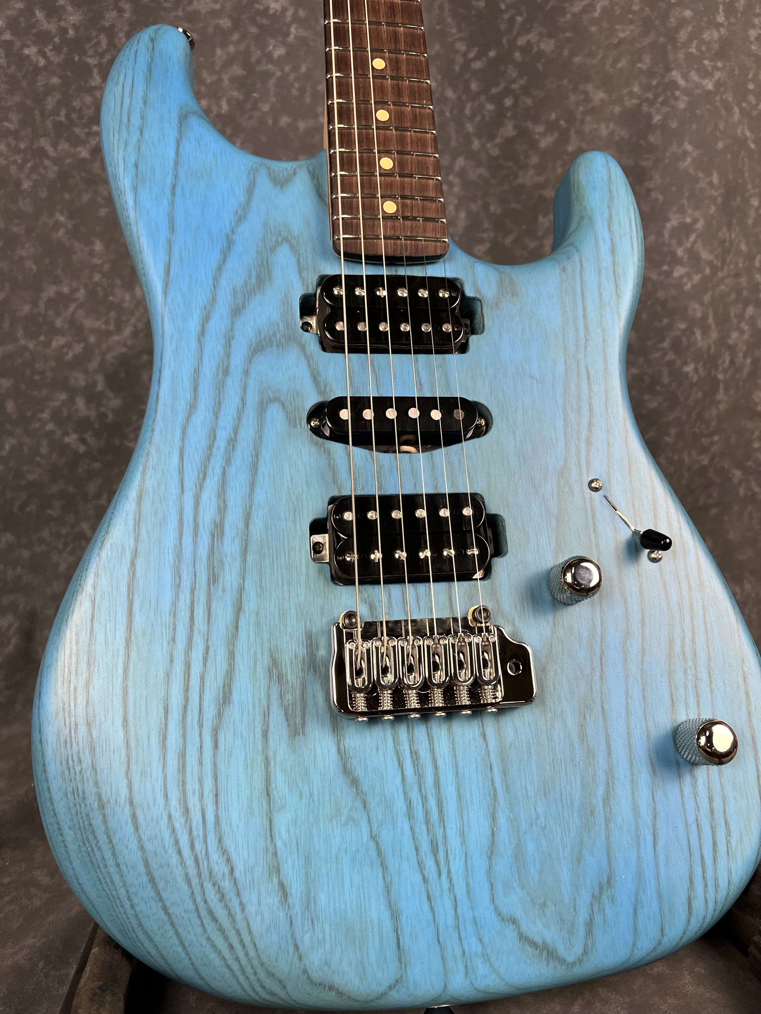 XT3 by lsl instruments with swamp ash and trans aqua satin finish