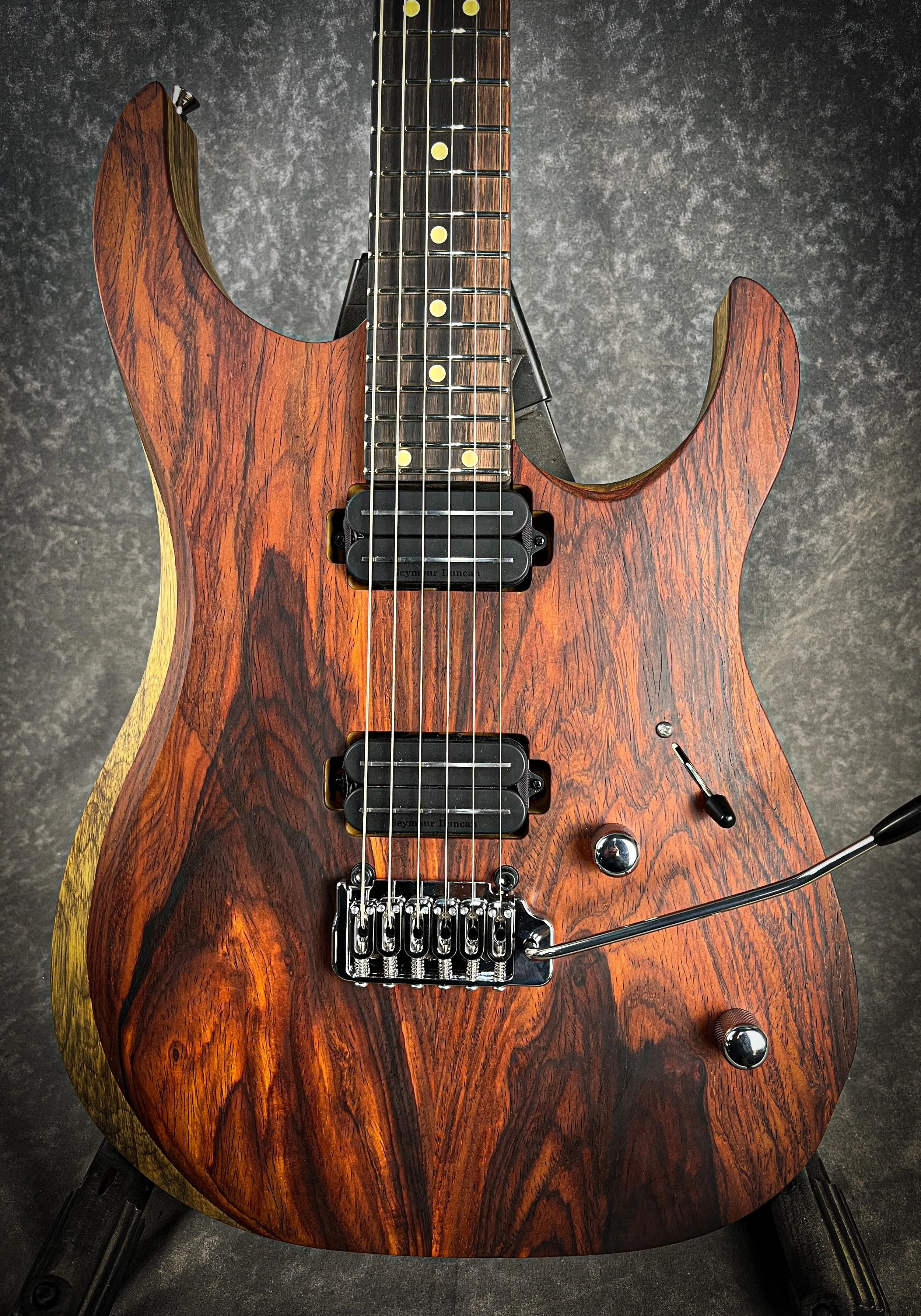 LSL Instruments XT models are modern super s style guitars with 22 or 24 frets and loads of exotic upgrade options. Cocobolo and black Limba, mahogany, quilted maple and custom finishes are common. Ebony or pale moon ebony  or macassar ebony availabl