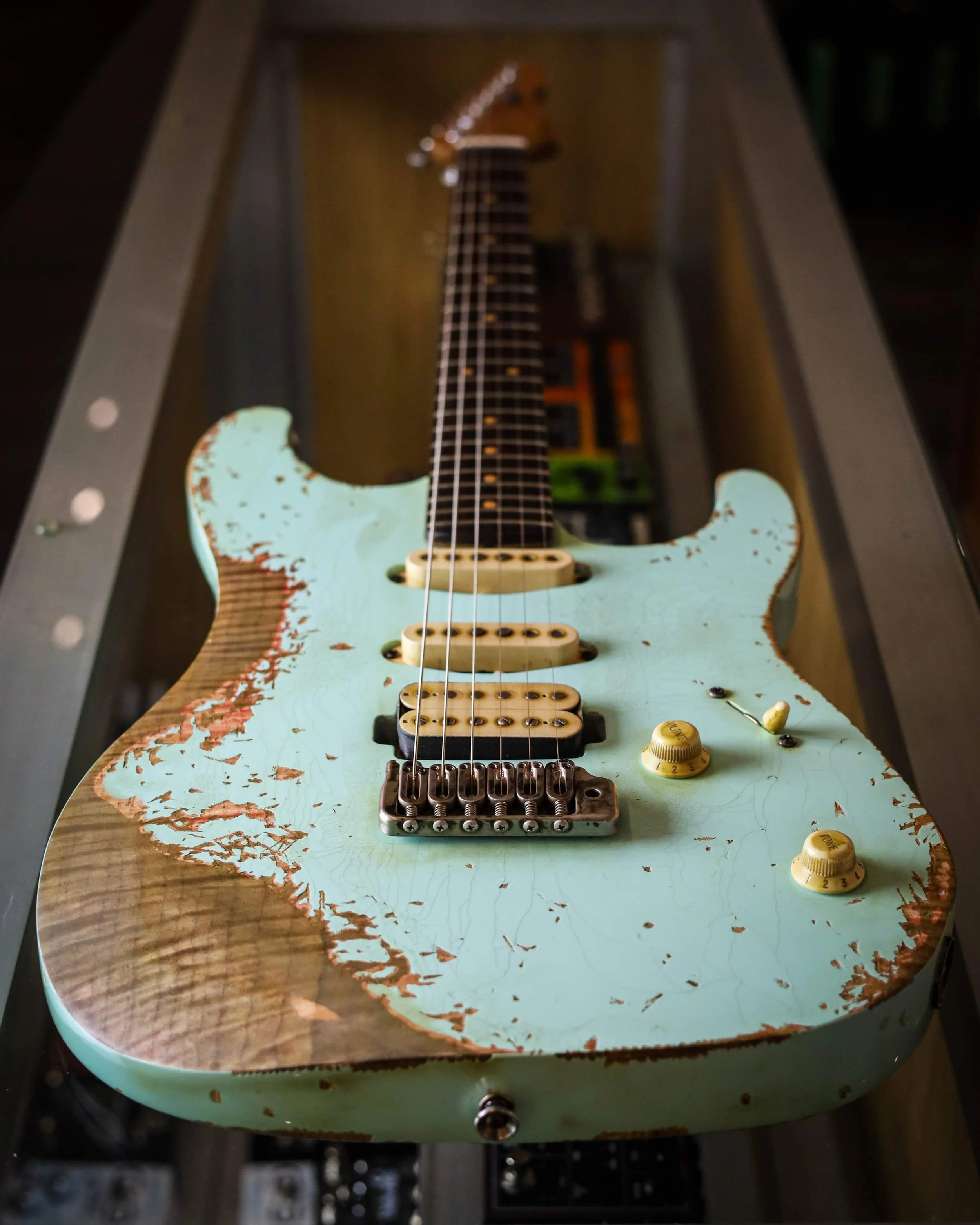 Killer xt3dx with flame top and Seafoam green aged back to expose flame maple top