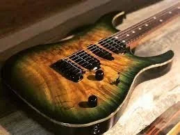 Faded trans green on burl maple xt4dx by lsl instruments