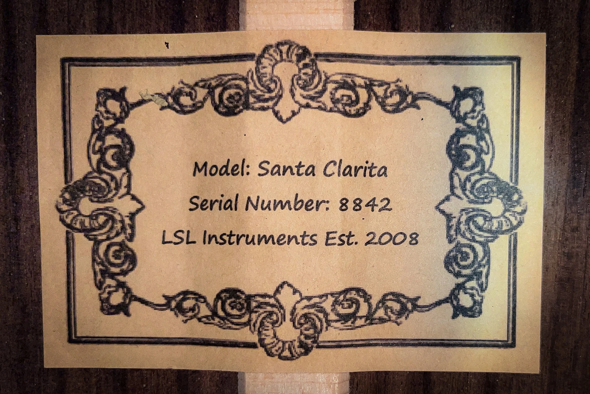 LSL Instruments Santa Clarita Dreadnought Cutaway Acoustic. Solid Rosewood back and sides, solid cedar top, herringbone binding, fishman electronics, Graphtech hardware. High quality import collaboration acoustic models.