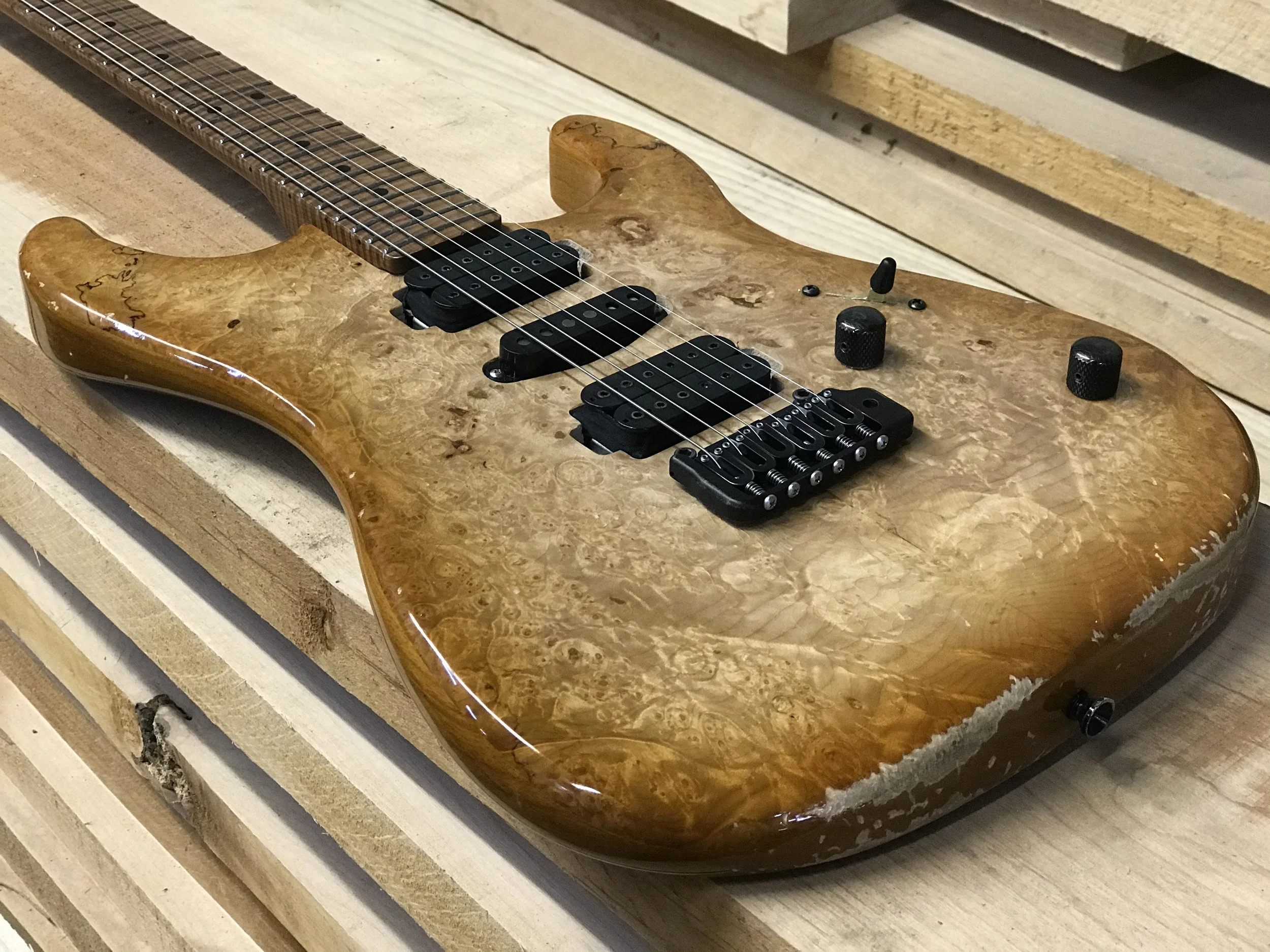 LSL Instruments XT models are modern super s style guitars with 22 or 24 frets and loads of exotic upgrade options. Cocobolo and black Limba, mahogany, quilted maple and custom finishes are common. Ebony or pale moon ebony  or macassar ebony availabl