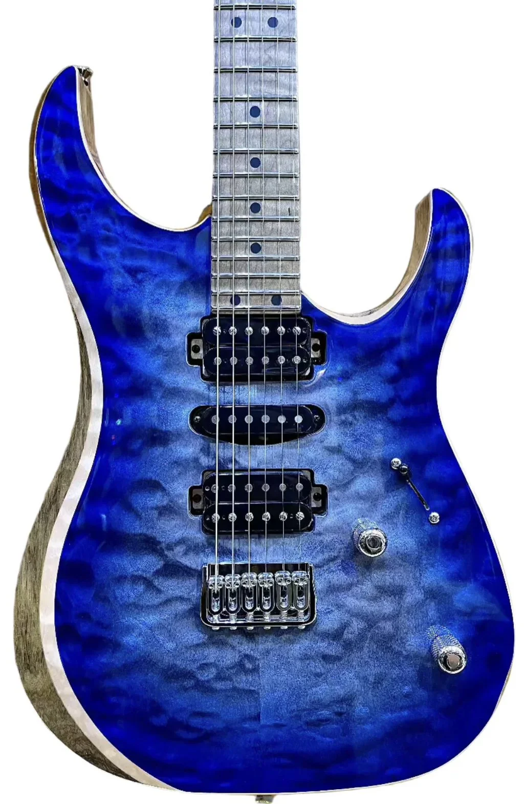 LSL Instruments XT models are modern super s style guitars with 22 or 24 frets and loads of exotic upgrade options. Cocobolo and black Limba, mahogany, quilted maple and custom finishes are common. Ebony or pale moon ebony  or macassar ebony availabl
