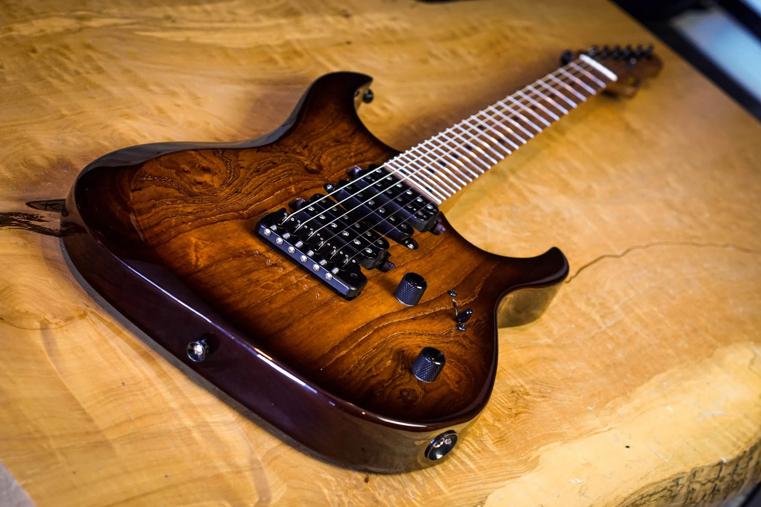 XT4 by lsl instruments in roasted ash body with burst finish