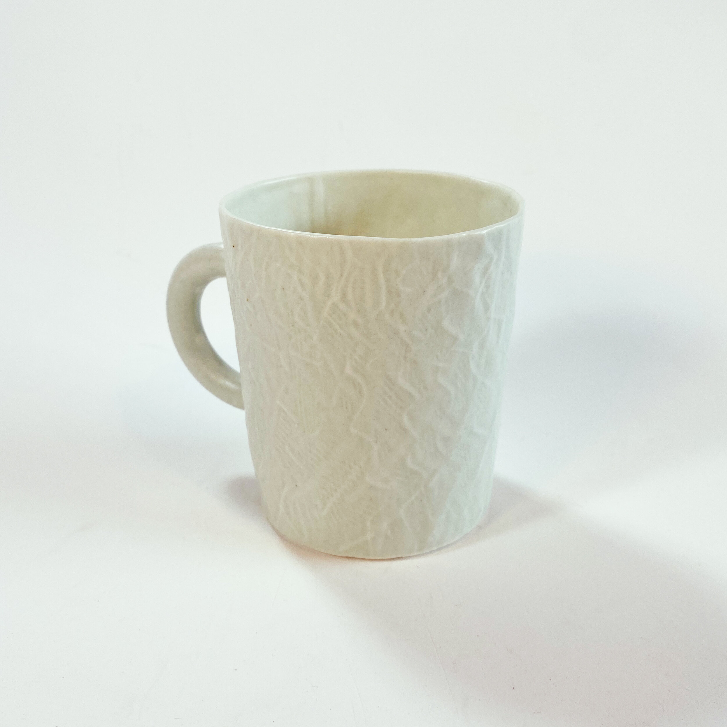 Pale celadon blue porcelain mug cup