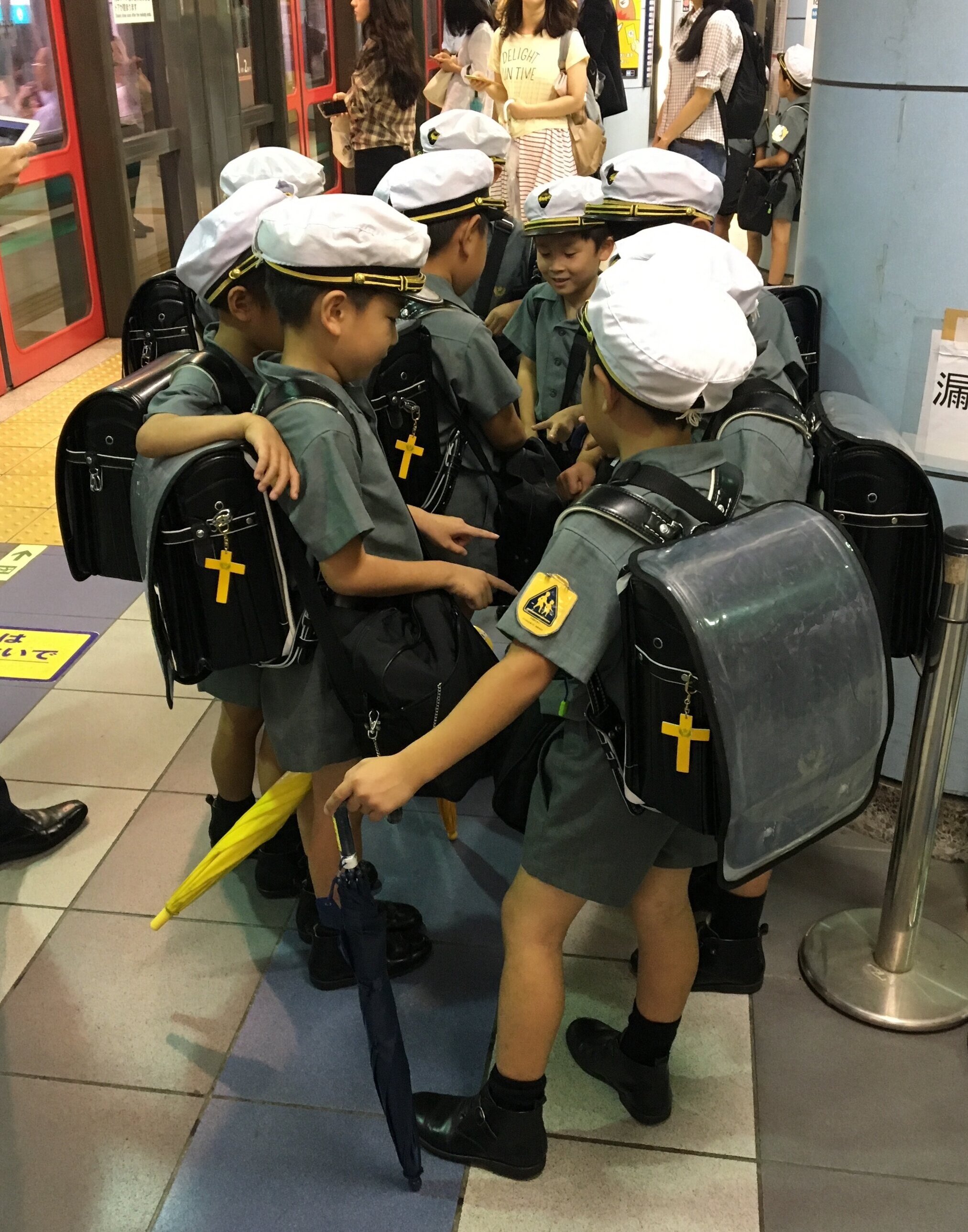 kids in school uniform, Tokyo subway