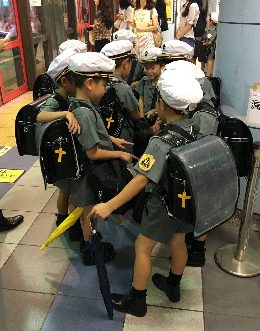 kids in school uniform, Tokyo subway