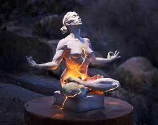 When I was meditating on the super New Moon in Aquarius happening Friday, I immediately pictured this famous statue Cracked Light by Paige Bradley. It is stunning. A woman, in a meditative position, having reconnected with her power, her inner source