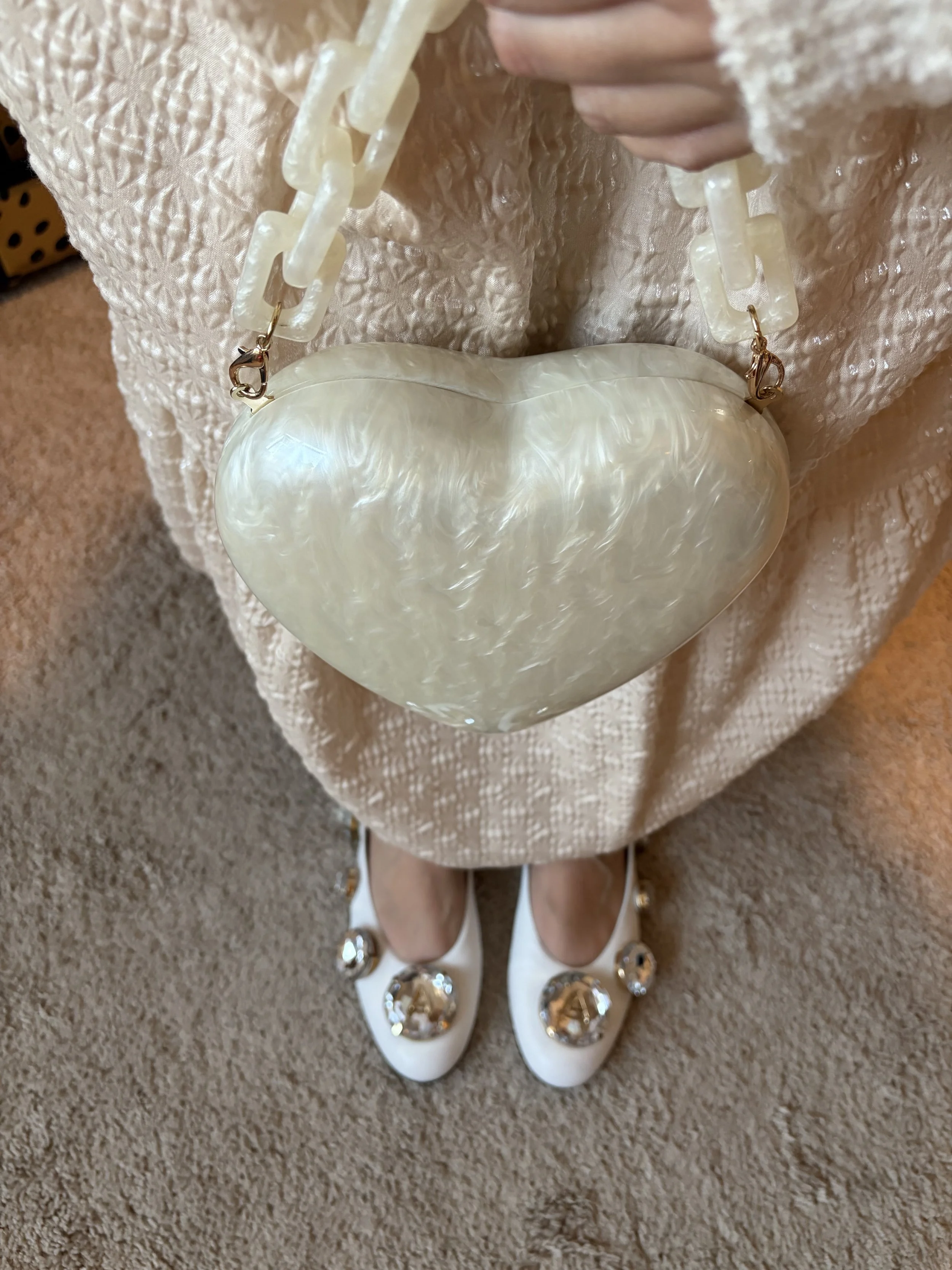 A New Day Heart purse and Area flats
