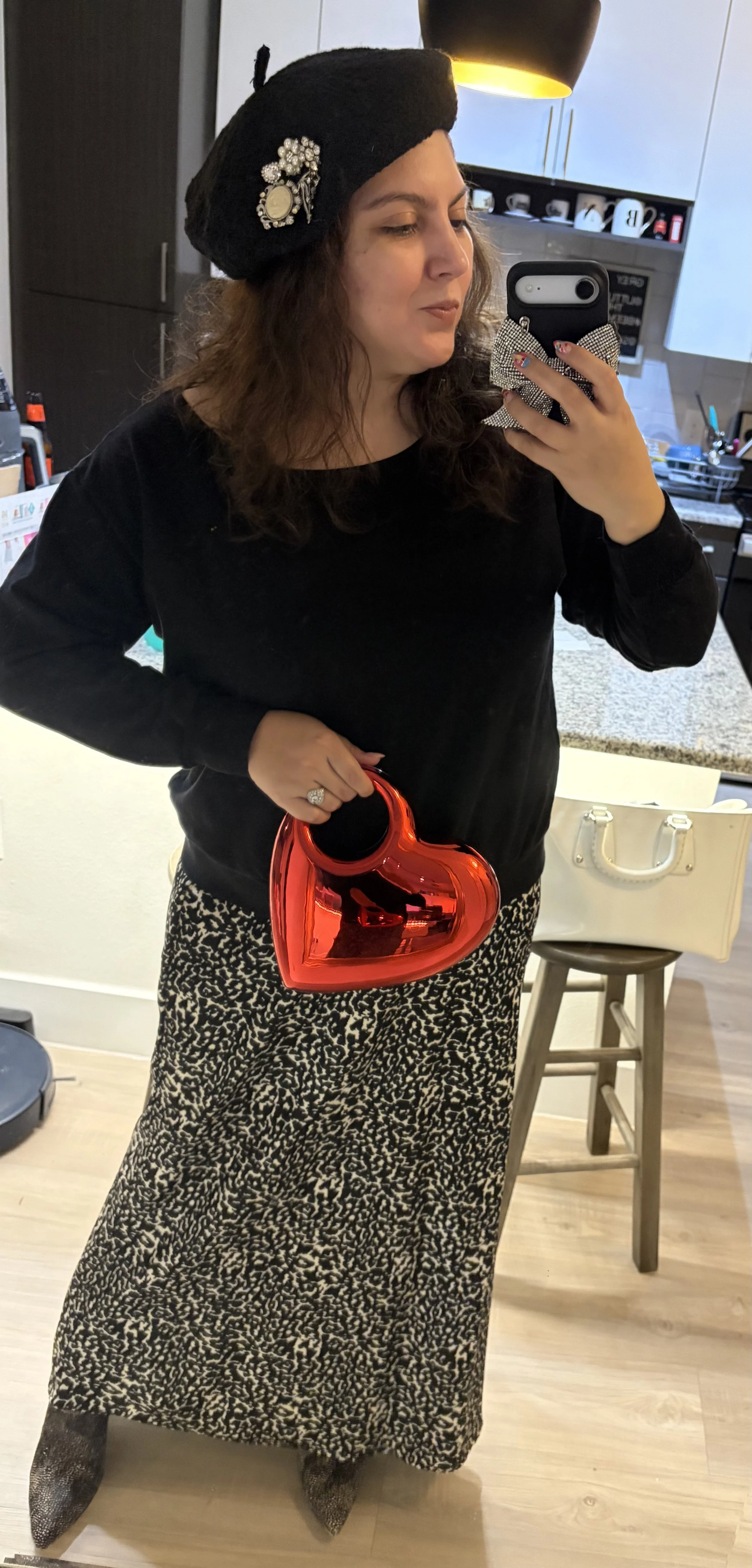 Outfit featuring animal print skirt, boots, beret, and heart bag