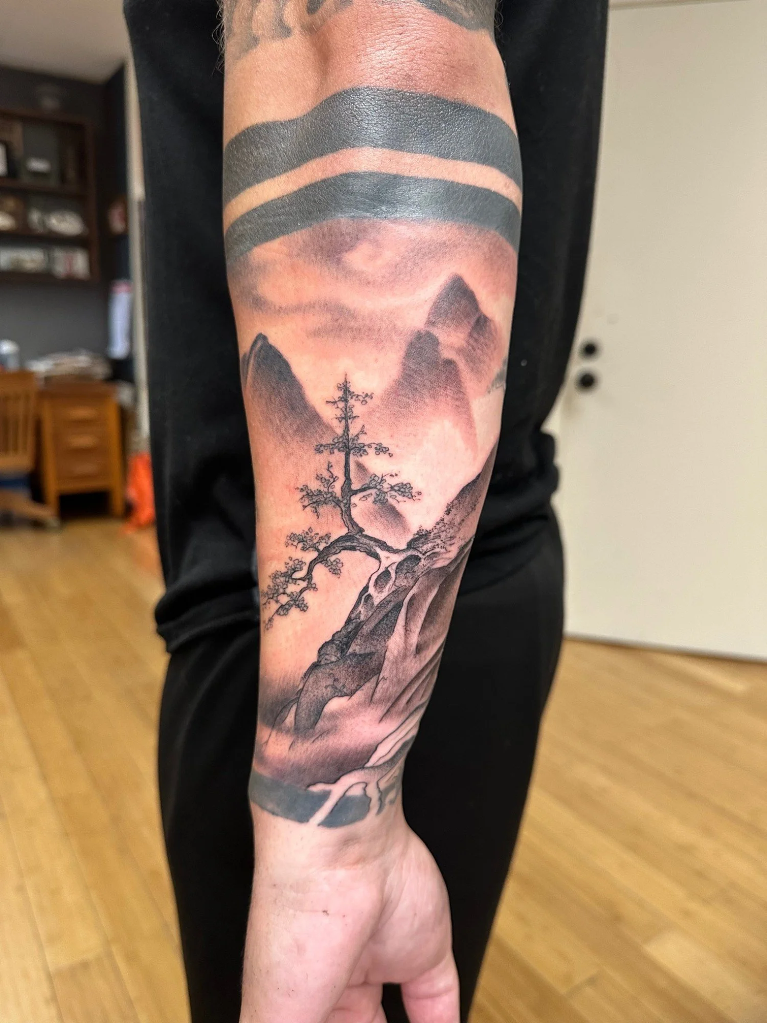 mountain-landscape-forearm-tattoo-brian-foster.jpg