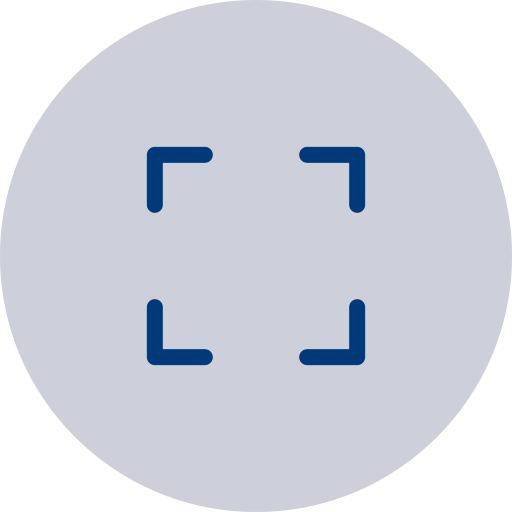 A circular viewfinder icon with four corner markers on a gray background.