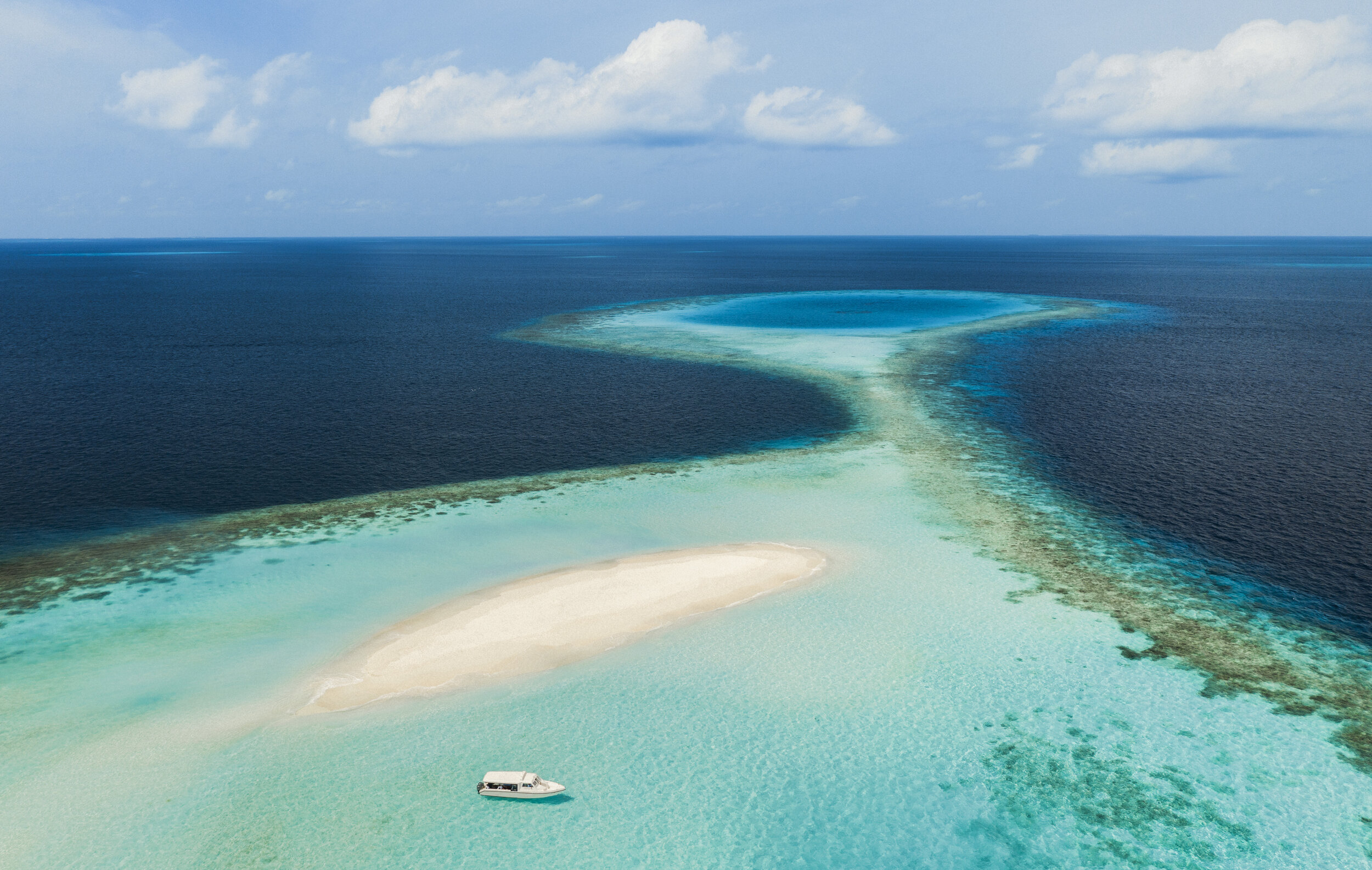 One&Only_Reethi Rah_Resort Maldives Beach_SandBank_Dhoni.jpg