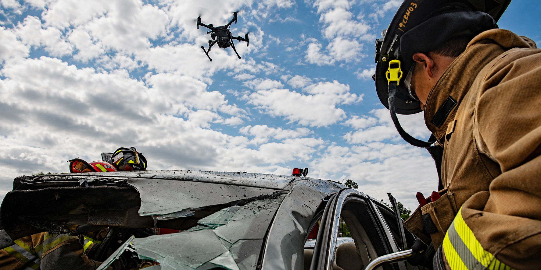 DJI Matrice 400 drone supporting public safety emergency response operations over a vehicle accident scene