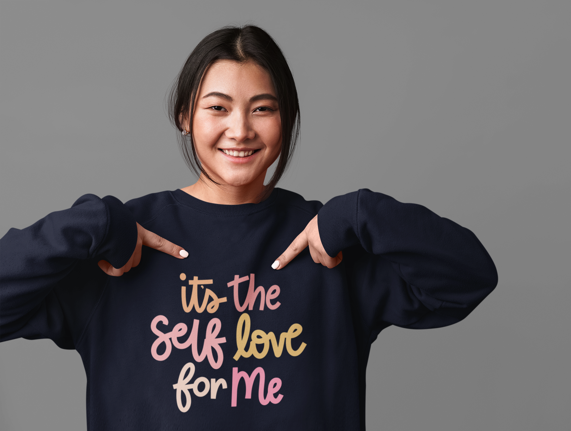 studio-mockup-of-a-woman-pointing-at-her-sweatshirt-37660-r-el2-2.png