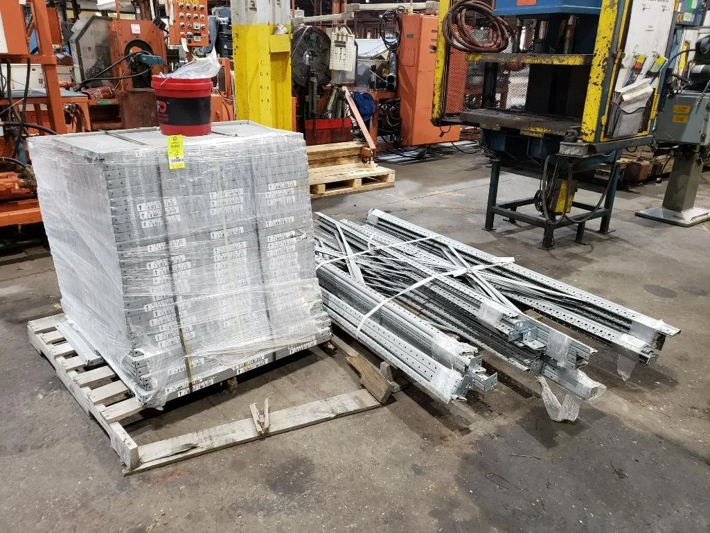 Qty 2 - Skids of Metal shelving uprights and shelves.