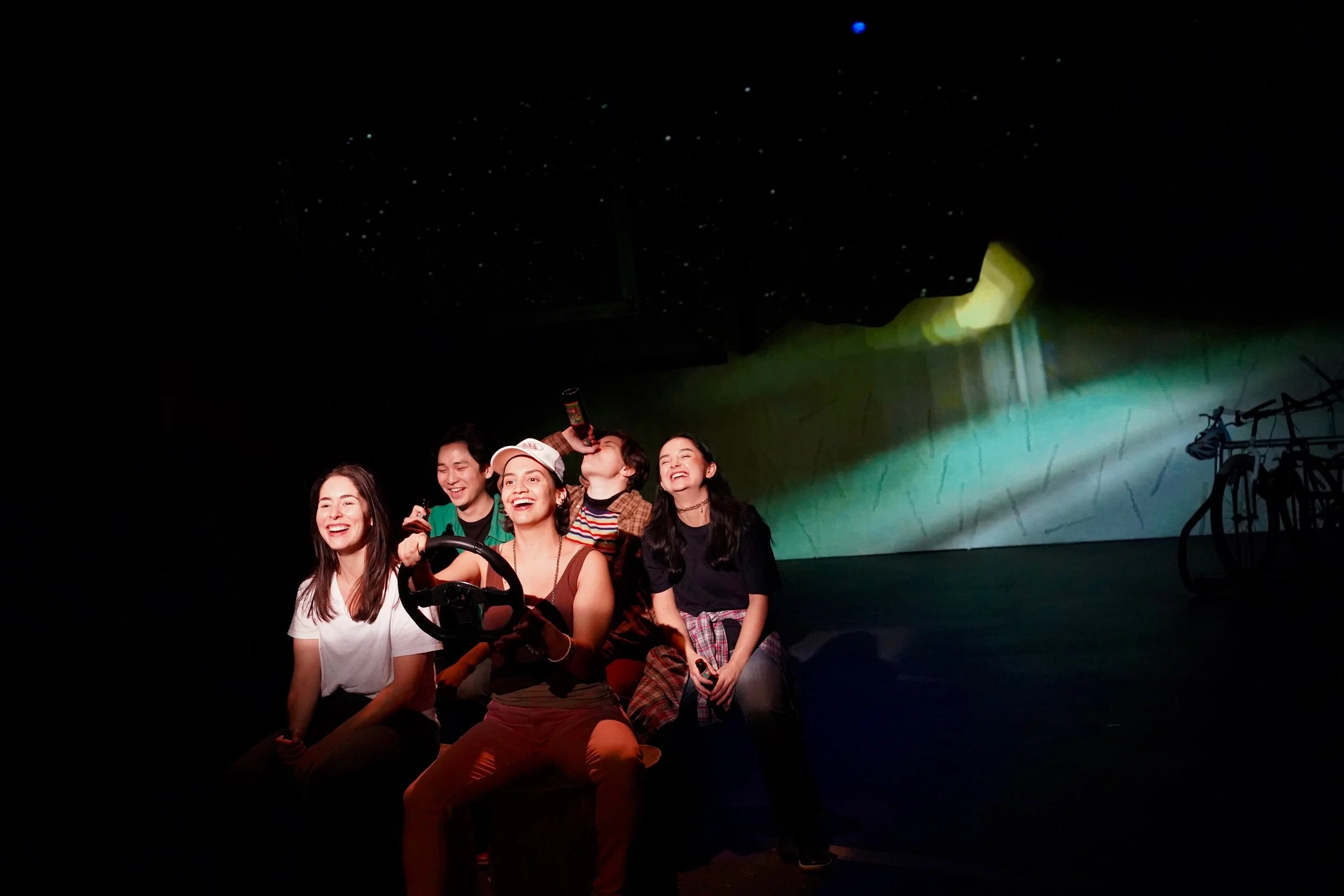 Peace Country at the Firehall Arts Centre. Cast -(Left to Right) Manuela Sosa, Kaitlyn Yott, Sof Rodreguiez, Sara Vickruck & Angus Yam. Set by Kim Reddy, Lights Jonathan Kim, Projection Andie Llyod.