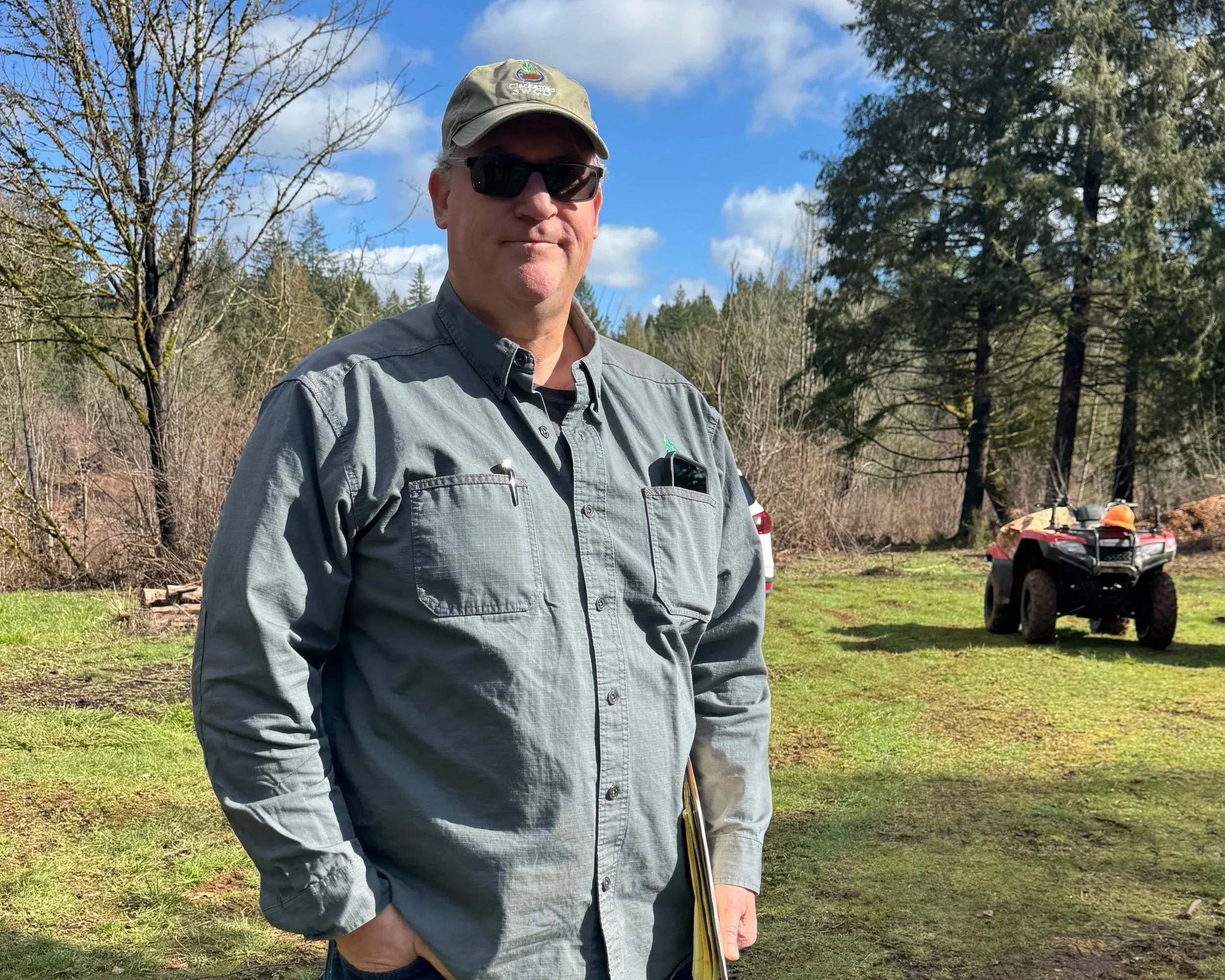  A forest landowner stands on his property, representing the leadership and stewardship of rural landowners caring for Oregon’s forests. 