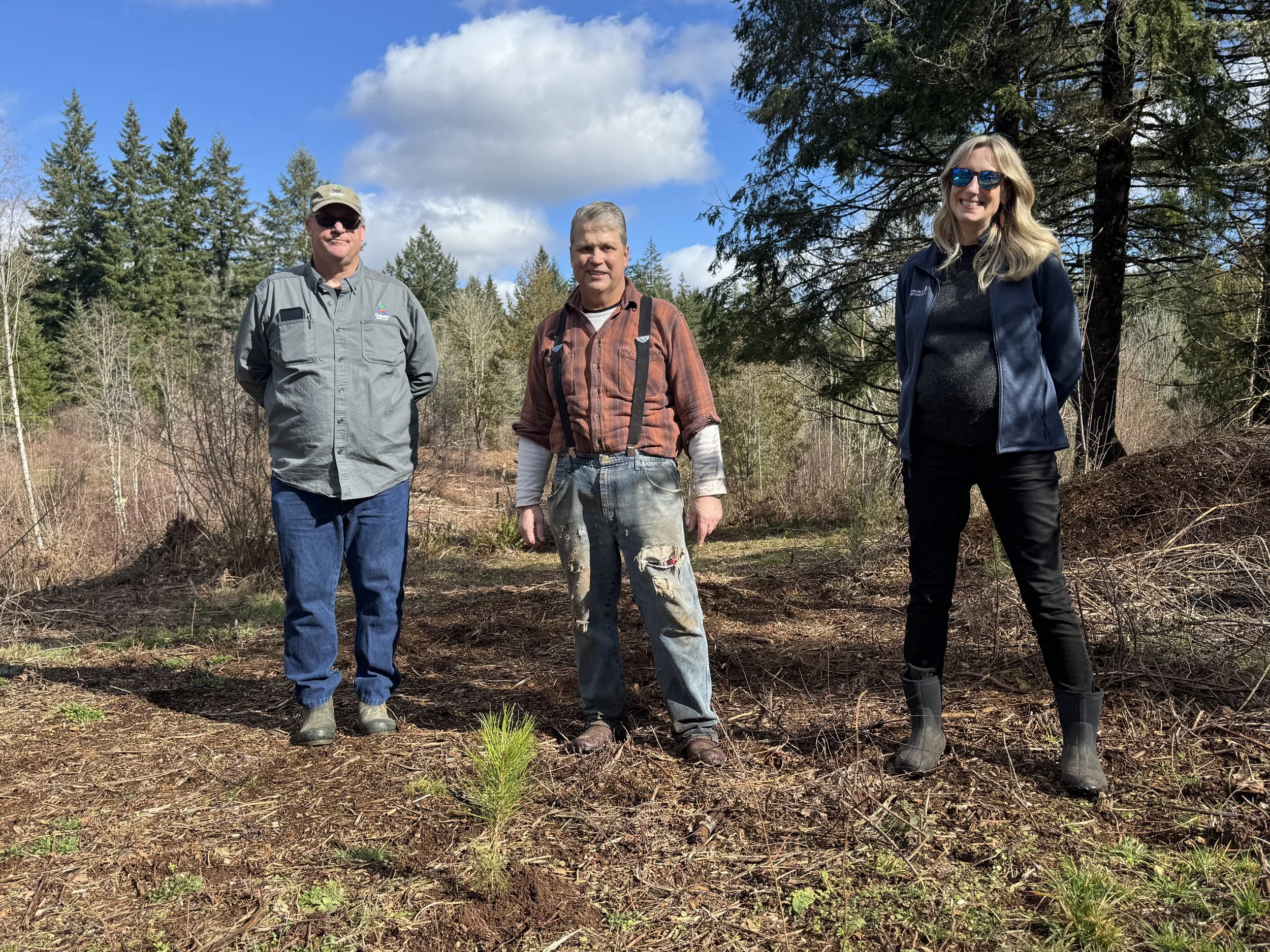  Scott Eden, Clackamas SWCD + Jason Delfel, landowner + Becca Shively, SNW on Delfel property during replanting, five years after Labor Day fires- credit SNW 