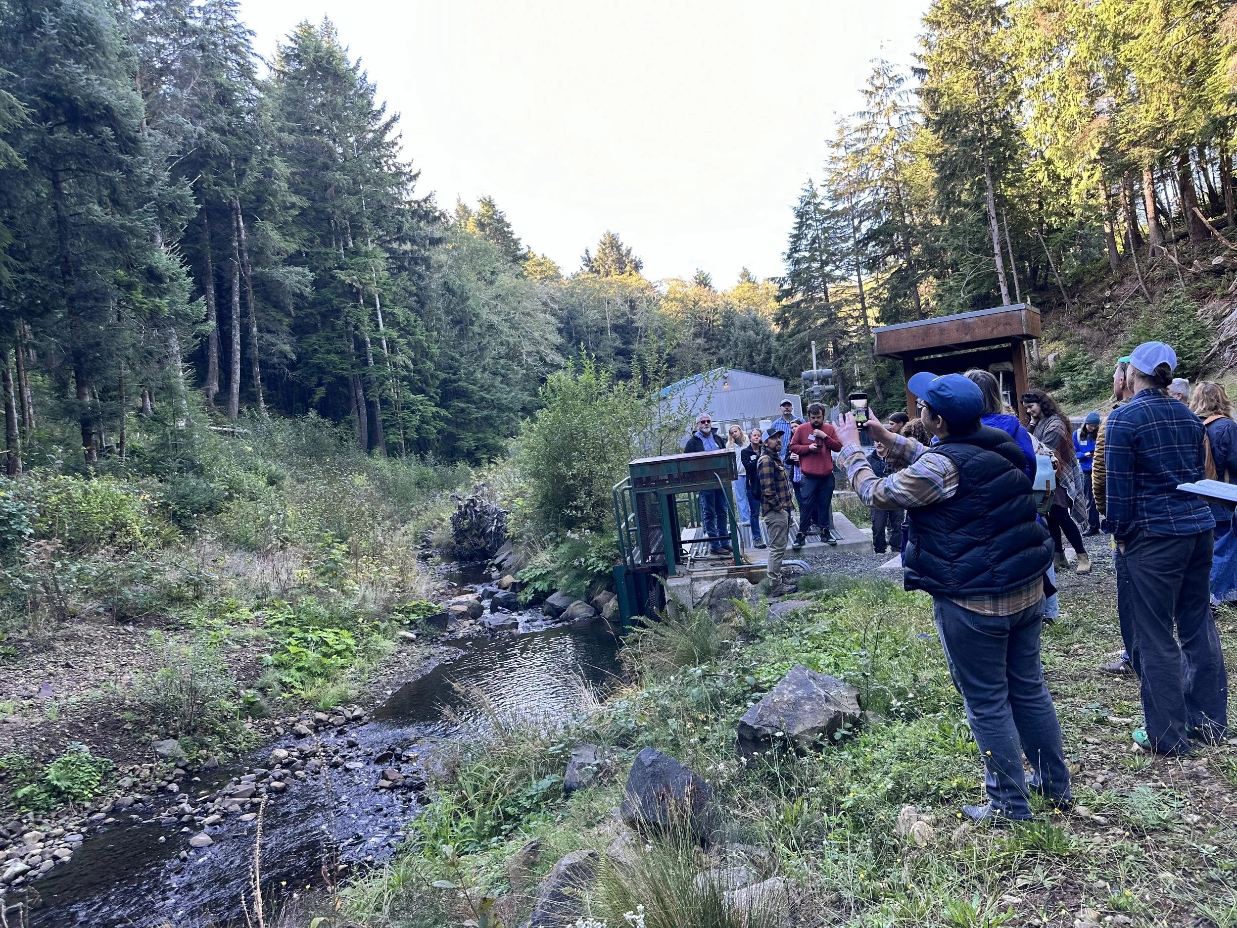  Community members and partners gather on site to tour and learn about the Jetty Creek watershed.  Photo courtesy Sustainable Northwest.   