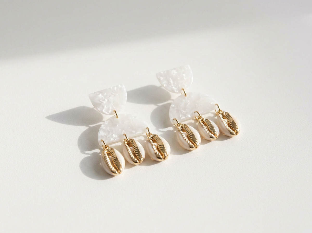 Inez Cowrie Earrings