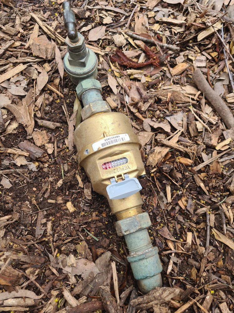 Water meter in a garden checked for a hidden leak