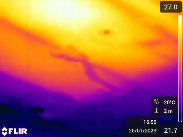 Thermal image of water spreading under a floor