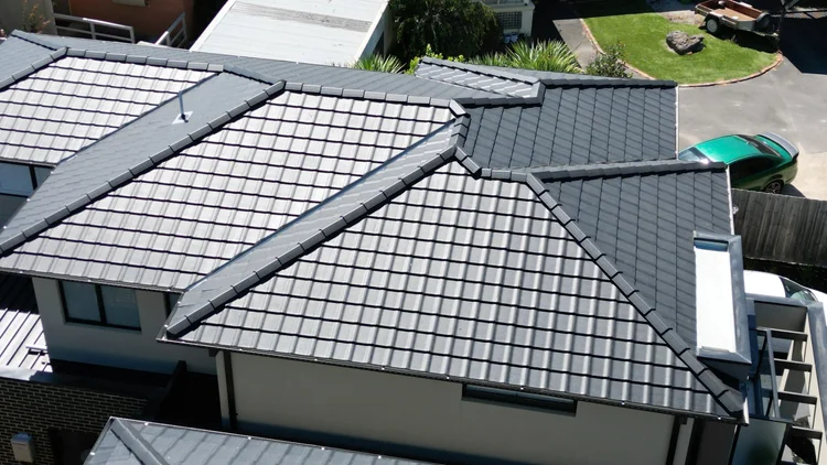 Drone view of a tiled roof during a roof leak inspection