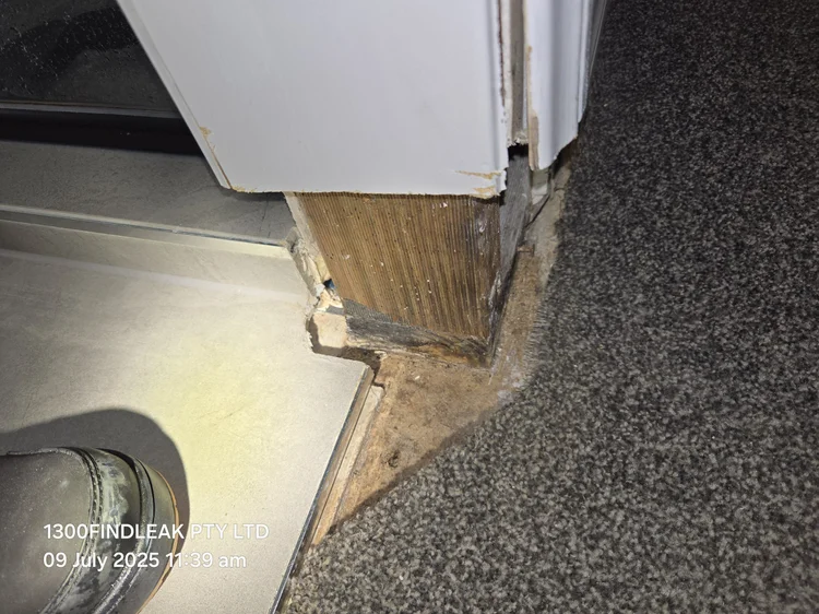 Damaged shower base and tiles from a leaking shower in Brisbane