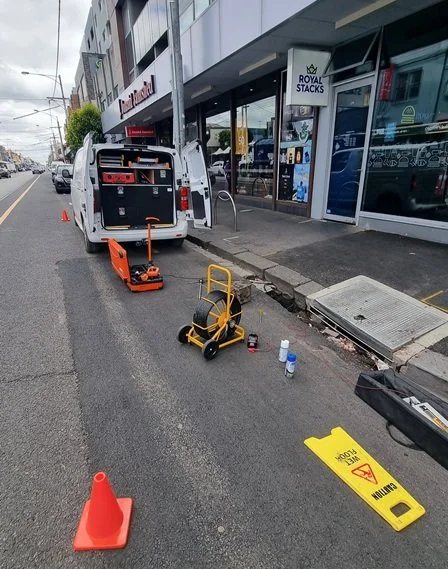 Licensed plumber performing precision pipe repair after successful non-invasive leak location to minimize property damage and restoration costs.