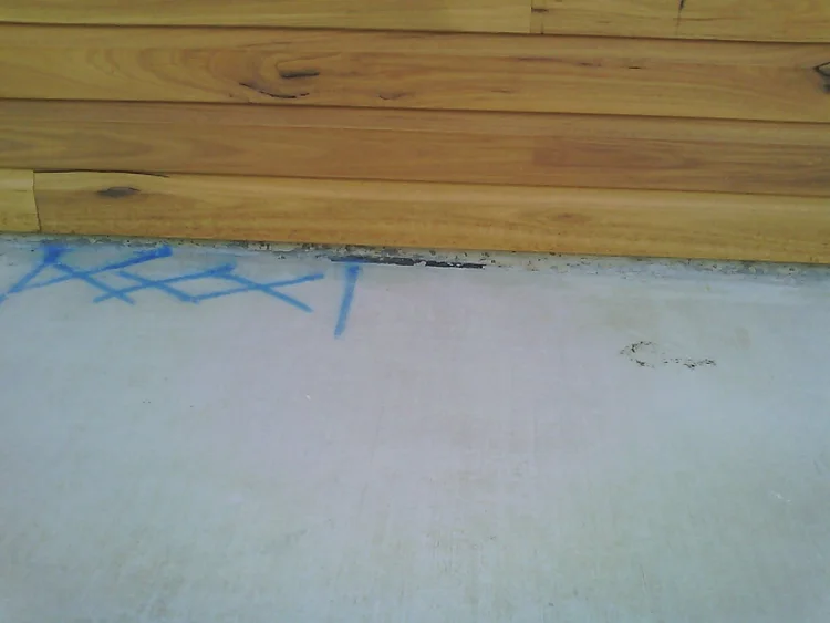 Floor tiles marked at the exact leak point after slab leak detection in Calamvale