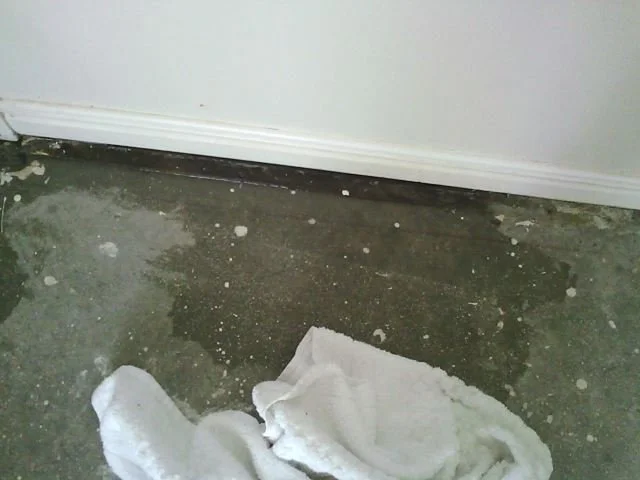 Water coming in from under a bedroom skirting board