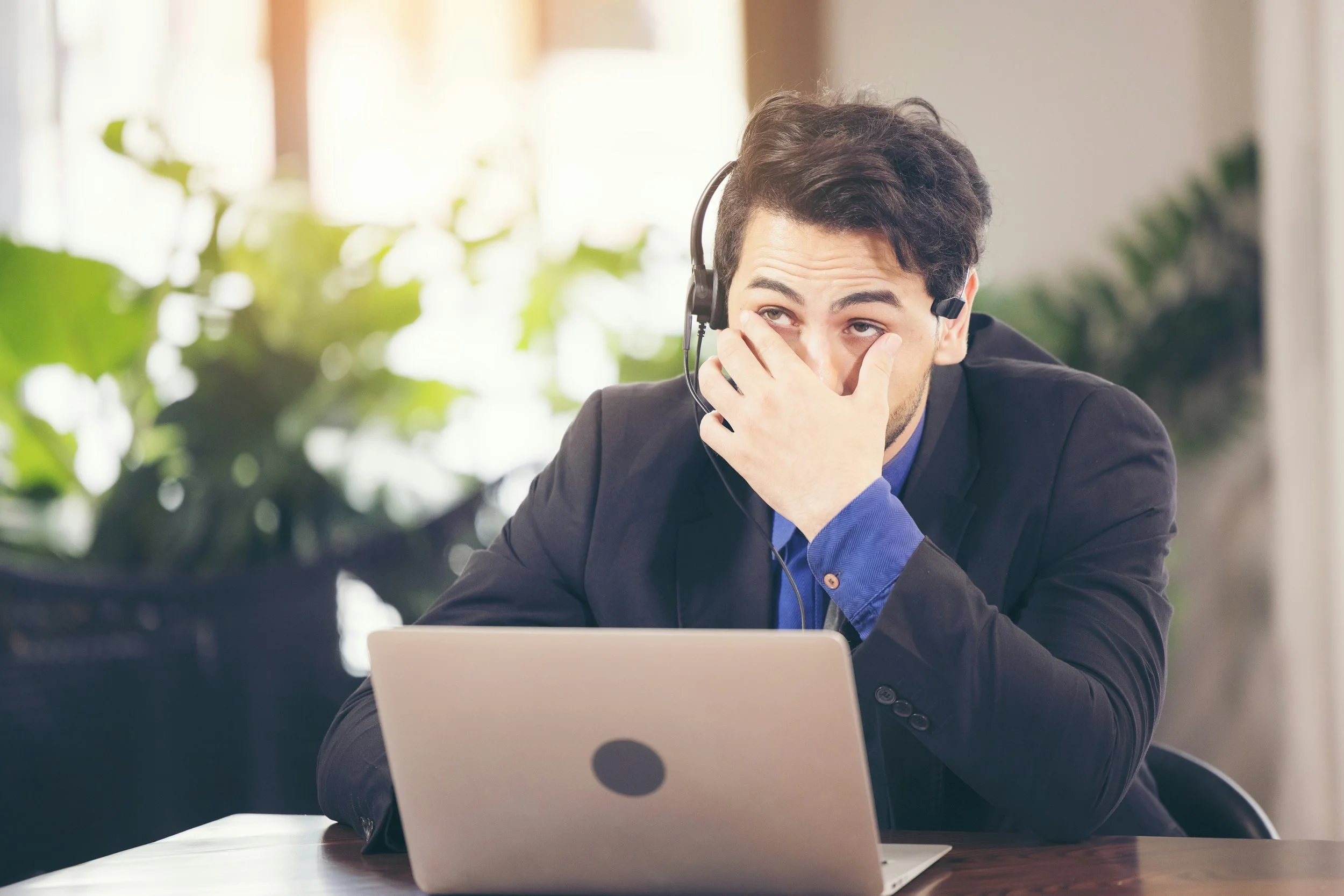 frustrated man on Zoom call | don't record podcasts on Zoom