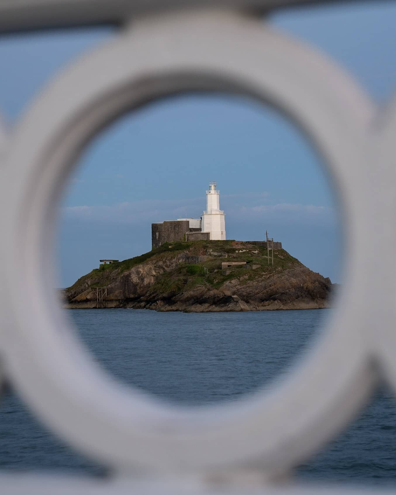 Through the Keyhole ⠀
⠀
Mumbles lighthouse during blue hour from a different perspective. ⠀
⠀
Currently in the Lake District for a week after two weeks driving around the west coast of Scotland.⠀
⠀
So much content to go through and edit which I'm goi