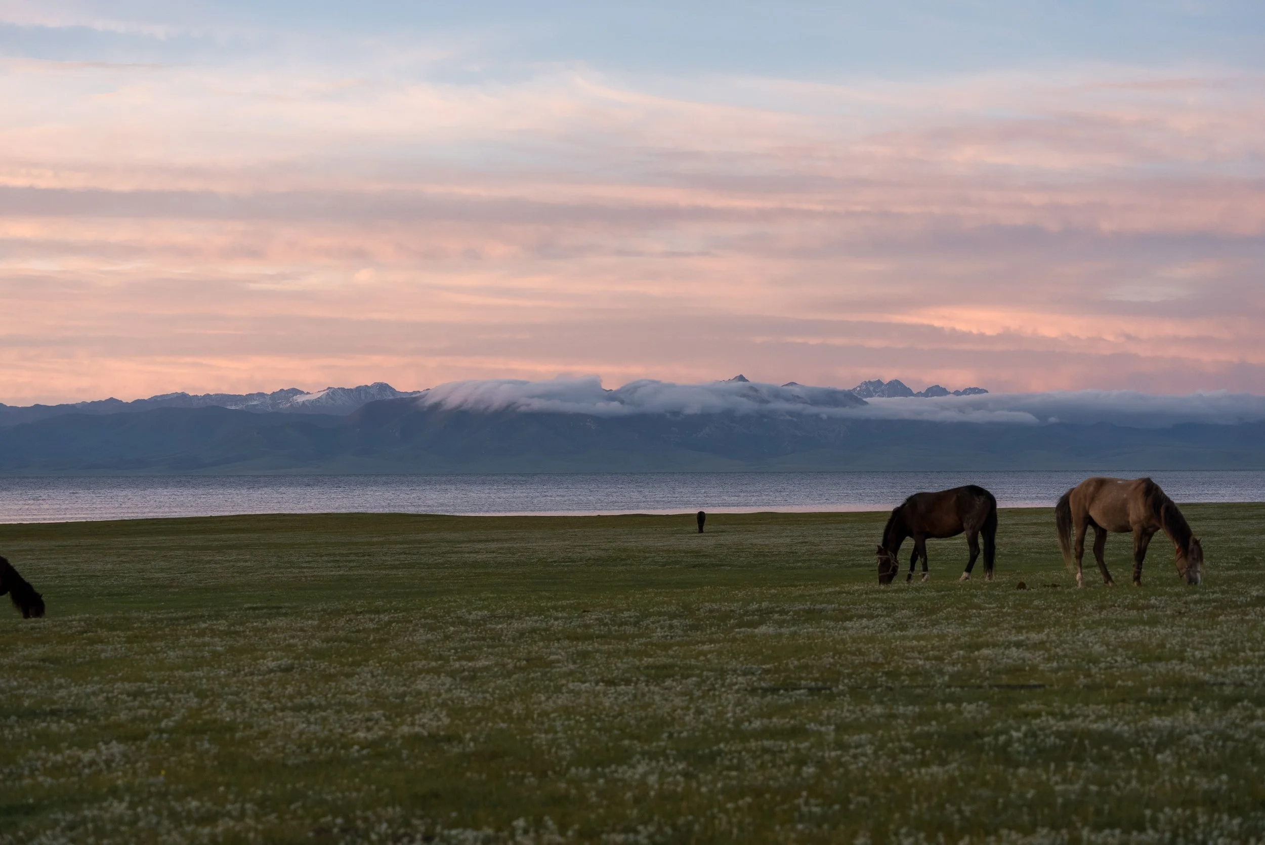 Sunset over a Traditional yurt camp at Song-Kul Lake, Kyrgyzstan