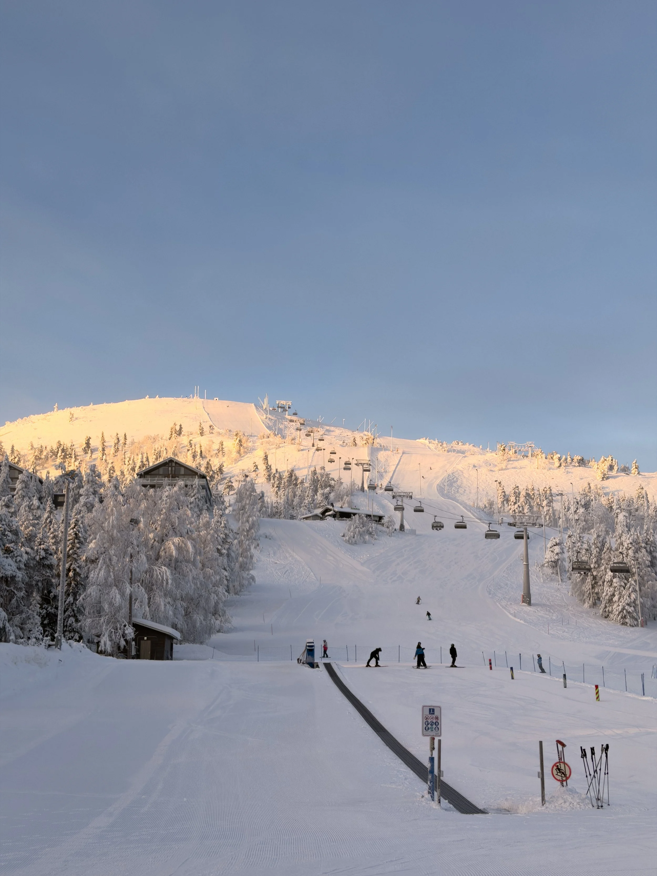 Golden hour skiing at Pyhä ski resort in Finnish Lapland
