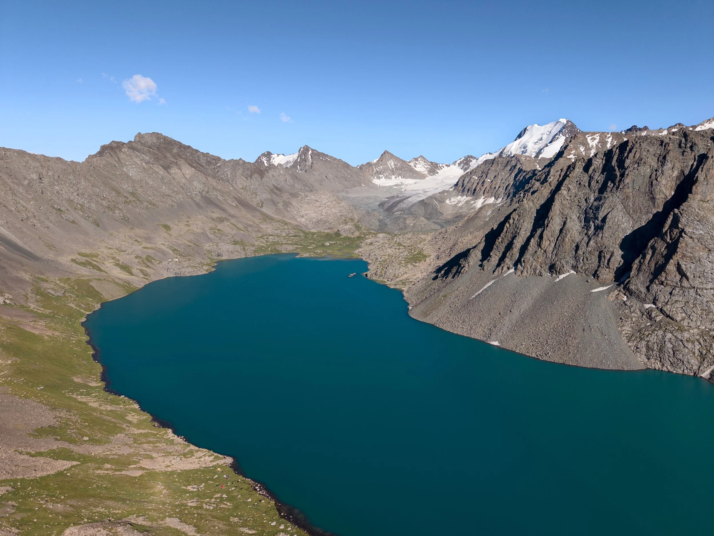 Turquoise waters of Ala-Köl Lake in Kyrgyzstan