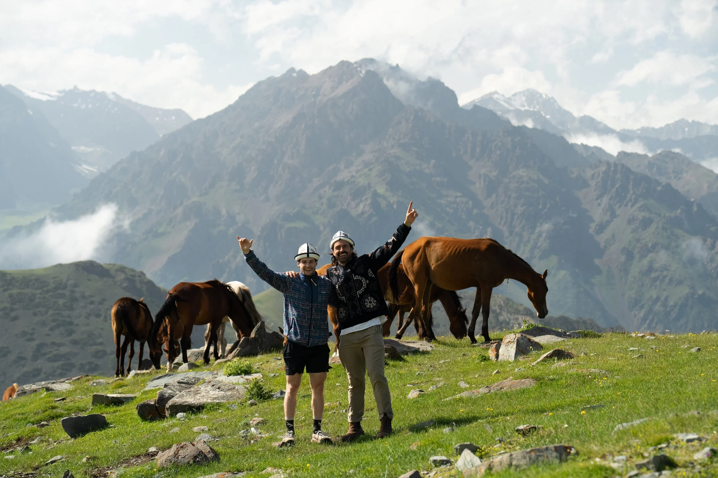 Wild horses grazing in the mountains of Kyrgyzstan