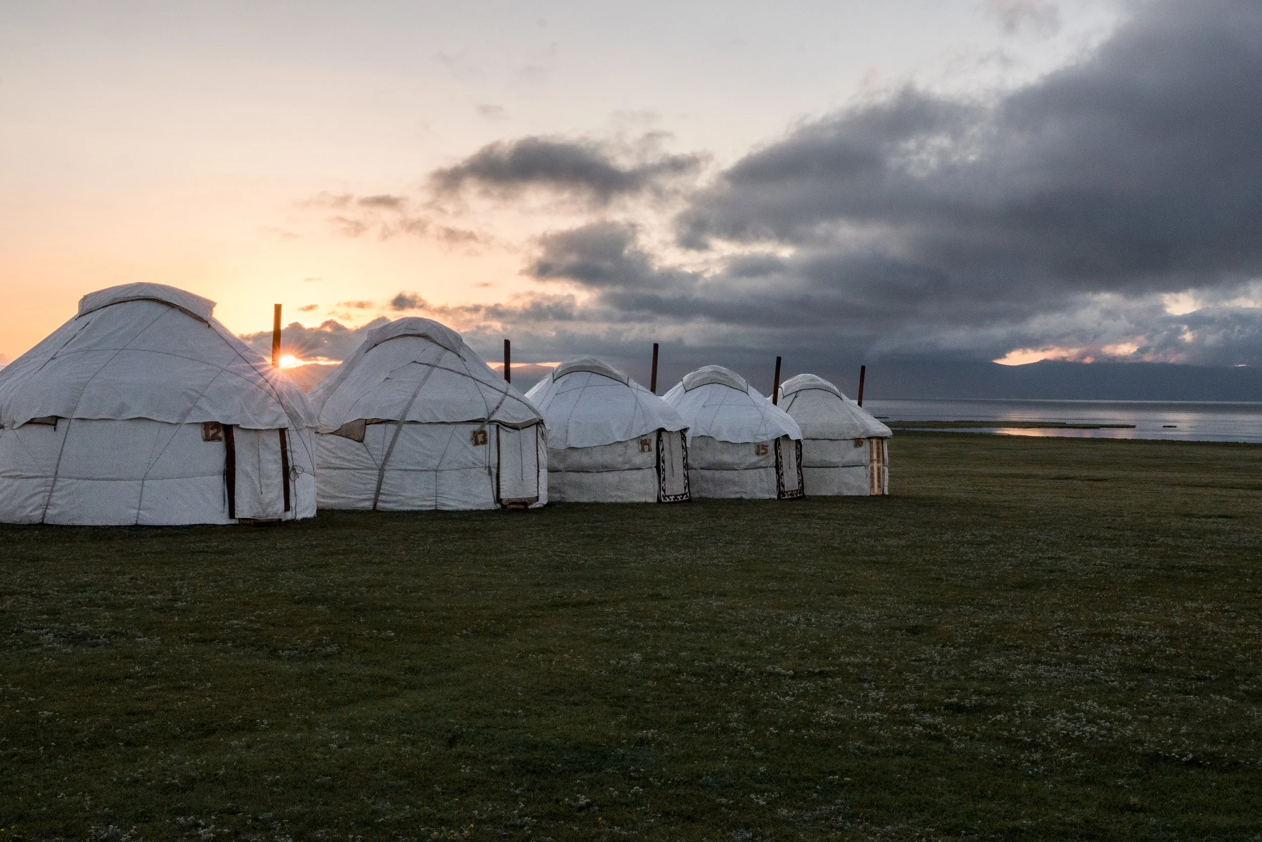 Sunset over a Traditional yurt camp at Song-Kul Lake, Kyrgyzstan