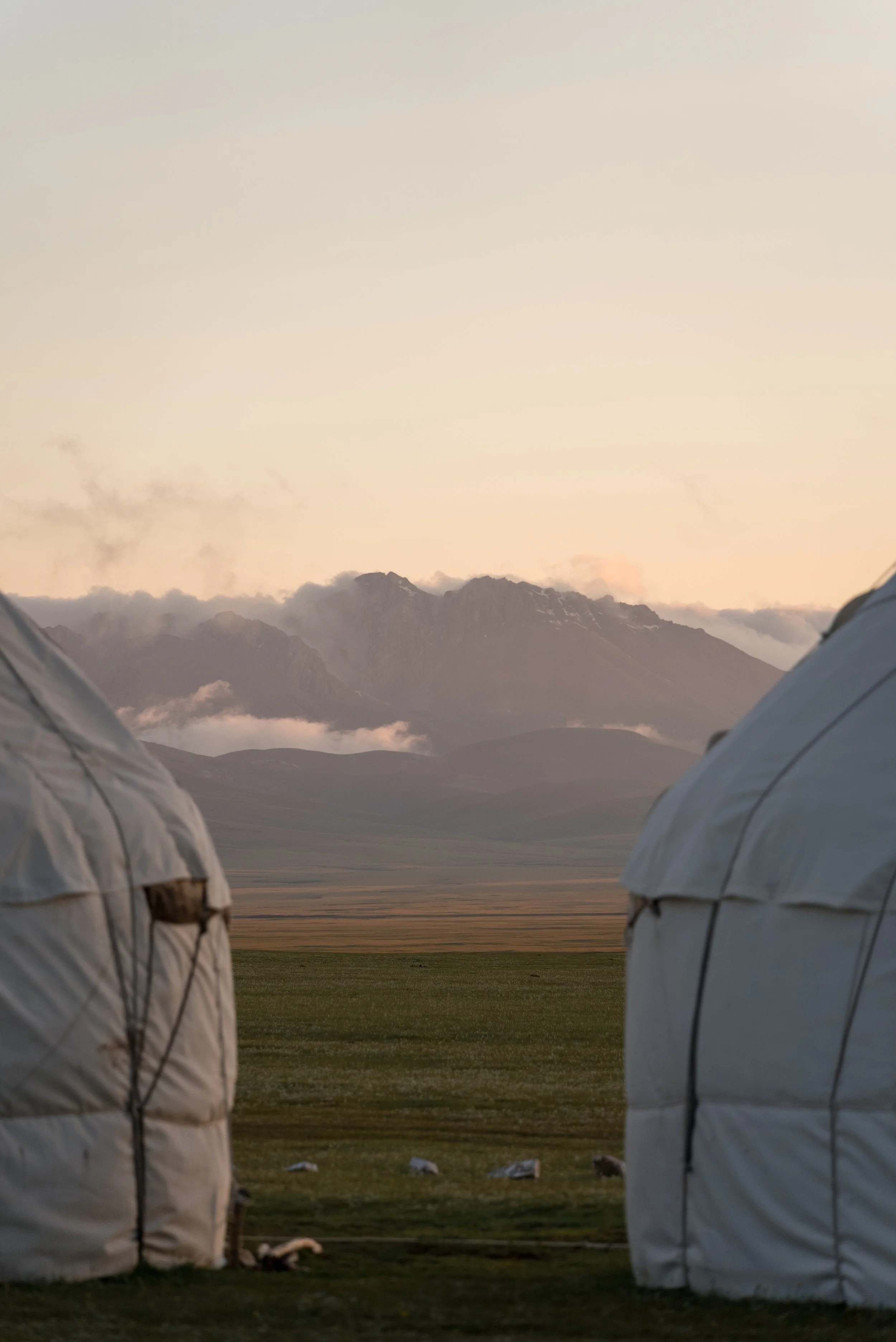 Sunset over a Traditional yurt camp at Song-Kul Lake, Kyrgyzstan