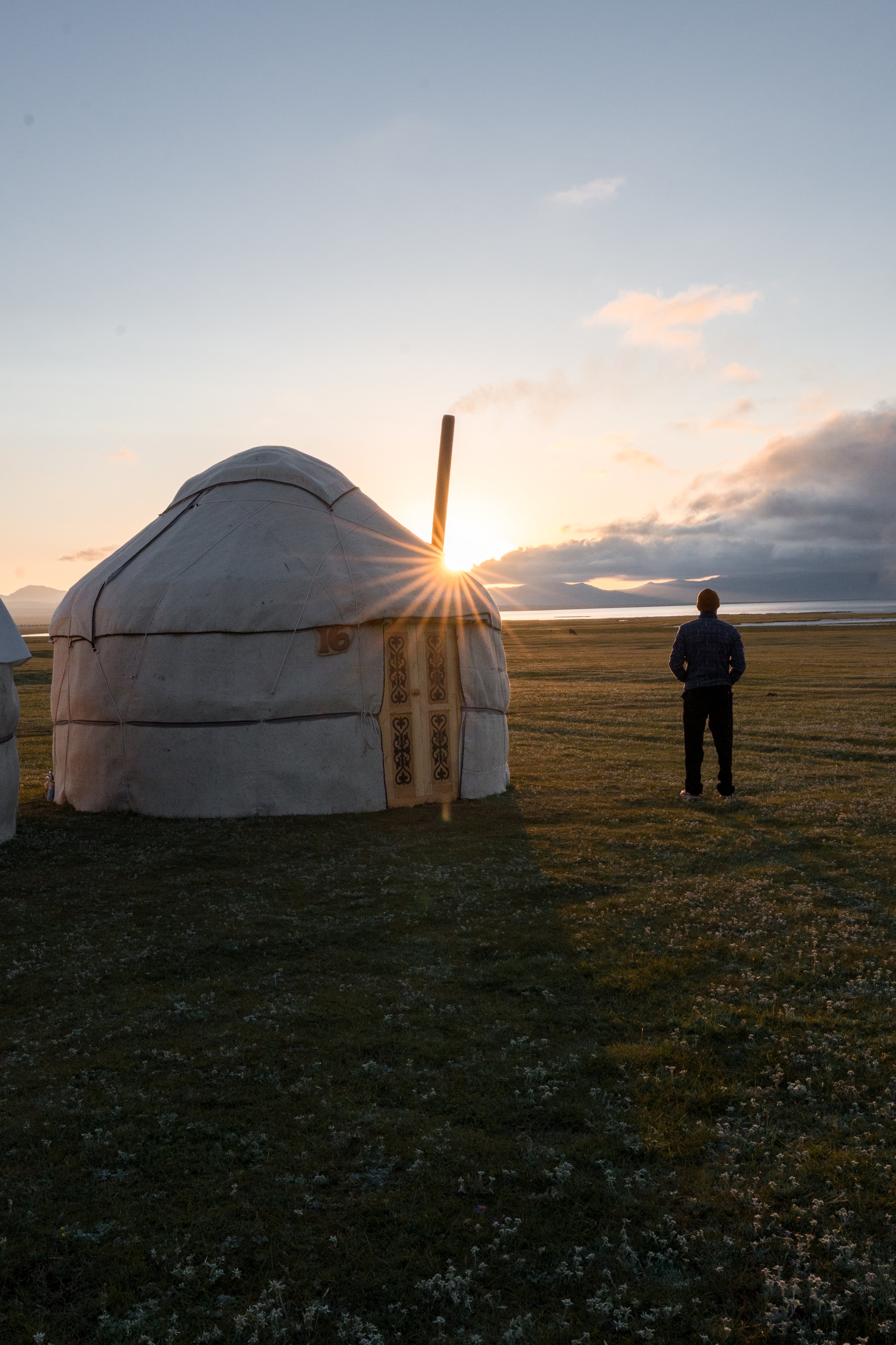 Sunset over a Traditional yurt camp at Song-Kul Lake, Kyrgyzstan