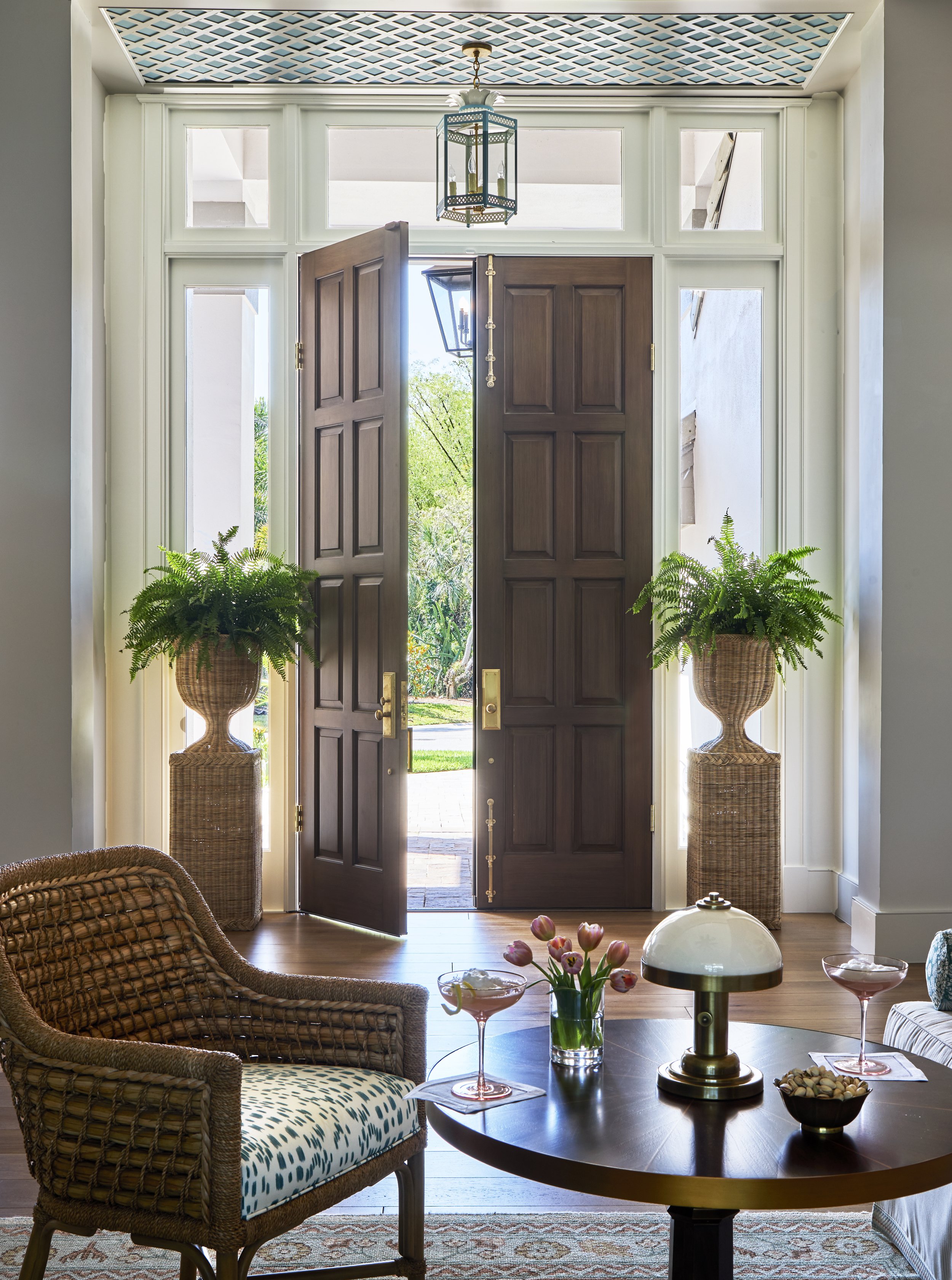 Luxury waterfront home in Bonita Springs, Florida, designed by North Shore Nest with layered coastal textures, colorful tones, and indoor-outdoor living.