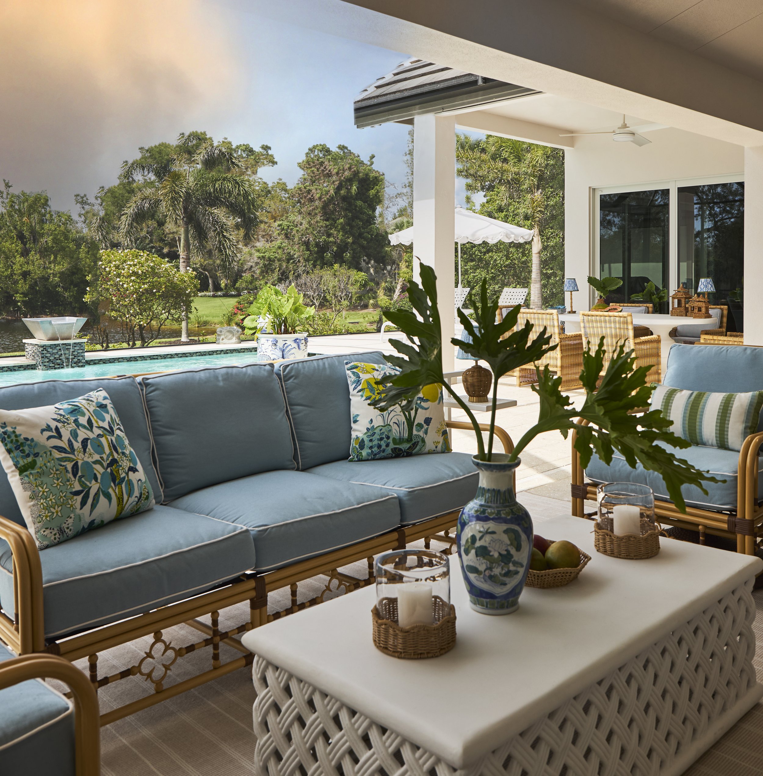 Luxury waterfront home in Bonita Springs, Florida, designed by North Shore Nest with layered coastal textures, colorful tones, and indoor-outdoor living.